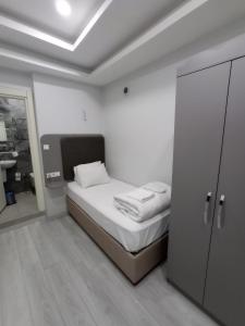 Postel nebo postele na pokoji v ubytování Emin Konak Hotel