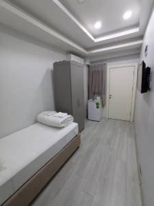 Postel nebo postele na pokoji v ubytování Emin Konak Hotel