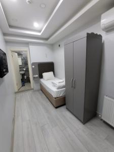 Postel nebo postele na pokoji v ubytování Emin Konak Hotel