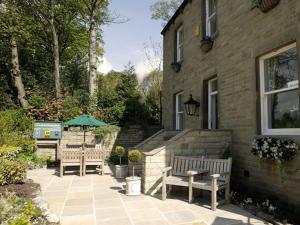 Taman di luar Grassington Lodge