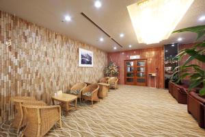The lobby or reception area at Okido Hotel