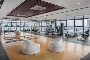 The fitness centre and/or fitness facilities at The Peninsula Phnom Penh