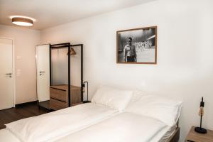 Postel nebo postele na pokoji v ubytování Dihei - Hotel, Lounge, Bar