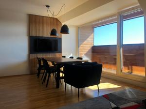 TV a/nebo společenská místnost v ubytování Apartmán O18 - Kleč + 37 fotografií