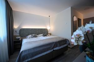 Postel nebo postele na pokoji v ubytování Kolping Gästehaus