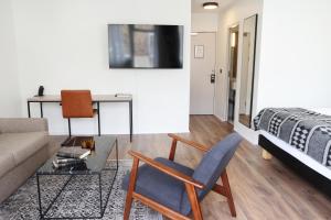 TV a/nebo společenská místnost v ubytování Fosshotel Lind
