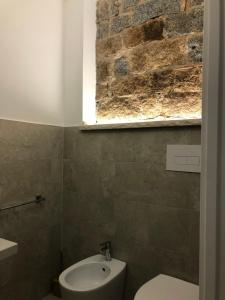 Koupelna v ubytování Longevity Hotel