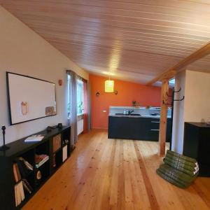 a large living room with a sink and a counter at Studio apartment and FREE airport transfer in Riga