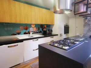 Kuchyň nebo kuchyňský kout v ubytování Apartment Keleia
