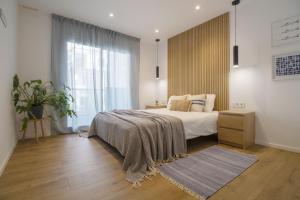 Postel nebo postele na pokoji v ubytování Vivalidays Apartour - Calella