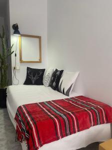 Un pat sau paturi într-o cameră la Apartamento Rincón del Cielo