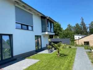 Ein Garten an der Unterkunft Ferienwohnung Am Südhang