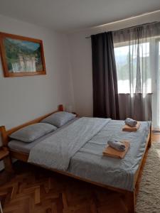 Кровать или кровати в номере Guest House Josipović