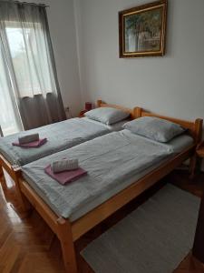 Postel nebo postele na pokoji v ubytování Guest House Josipović