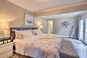 une chambre avec un grand lit et une fenêtre dans l'établissement Bright Concord Home with Amenity-Packed Patio!, à Concord