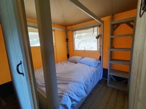 Postel nebo postele na pokoji v ubytování Tente Hula + 10 fotografií