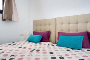 Posteľ alebo postele v izbe v ubytovaní Coqueto apartamento