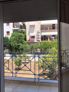 Balkón nebo terasa v ubytování Αγνάντι ενοικιαζόμενα δωμάτια