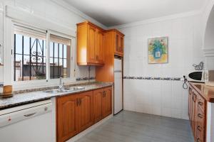 Kuchnia lub aneks kuchenny w obiekcie Villa Cruz del Sur - Solo familias