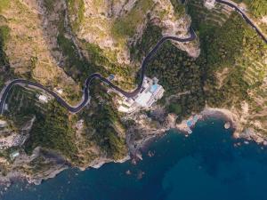 an aerial view of a road next to the water at Grand Hotel Tritone in Praiano
