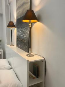 Posteľ alebo postele v izbe v ubytovaní Lycabettus Luxury Cave greendom