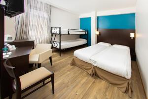 Postel nebo postele na pokoji v ubytování Hotel Bonotto