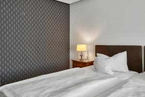 Postel nebo postele na pokoji v ubytování Hotel Kraft