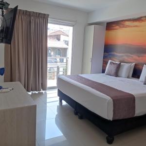Cama ou camas em um quarto em Hotel Granada Loft
