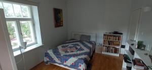 Postel nebo postele na pokoji v ubytování Herne Homestay