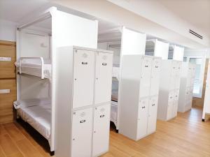 Ein Etagenbett oder Etagenbetten in einem Zimmer der Unterkunft ALBERGUE VALIN LAMA