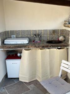A kitchen or kitchenette at Ciuri Ciuri