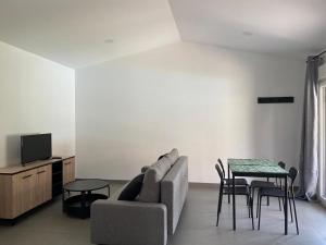 TV a/nebo společenská místnost v ubytování Acogedora casa de invitados