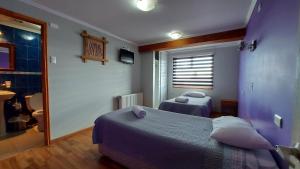Voodi või voodid majutusasutuse Hostal La Base toas