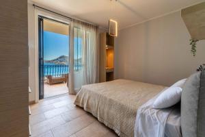 Кровать или кровати в номере Gold Sun Villas