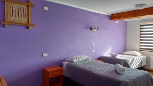 Voodi või voodid majutusasutuse Hostal La Base toas
