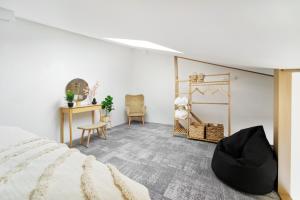 Posteľ alebo postele v izbe v ubytovaní Apartmán v stráni