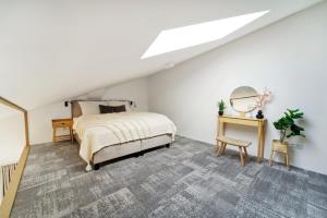 Posteľ alebo postele v izbe v ubytovaní Apartmán v stráni