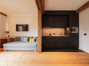 Kuchyň nebo kuchyňský kout v ubytování FIORI Dolomites Experience Hotel