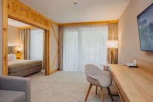 Posteľ alebo postele v izbe v ubytovaní Platinum Mountain Hotel&SPA