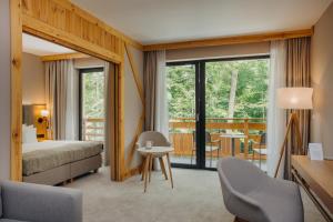 Posteľ alebo postele v izbe v ubytovaní Platinum Mountain Hotel&SPA