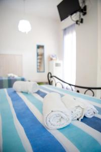 A bed or beds in a room at Vacanze al San Domenico