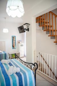 A bed or beds in a room at Vacanze al San Domenico
