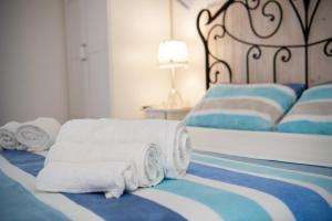 A bed or beds in a room at Vacanze al San Domenico