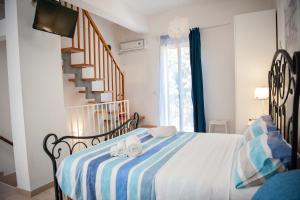 A bed or beds in a room at Vacanze al San Domenico