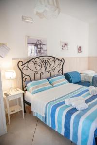 A bed or beds in a room at Vacanze al San Domenico
