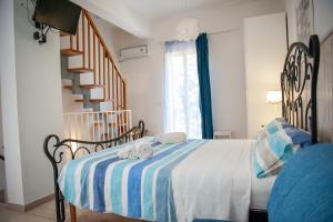 A bed or beds in a room at Vacanze al San Domenico