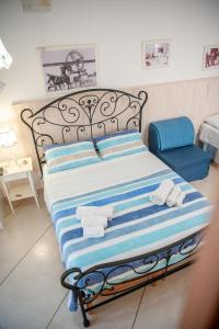 A bed or beds in a room at Vacanze al San Domenico