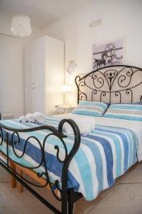 A bed or beds in a room at Vacanze al San Domenico