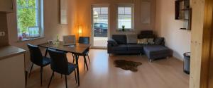 Posezení v ubytování Villa Toskana Wohnung 1
