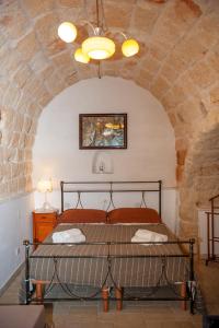 A bed or beds in a room at Vacanze al San Domenico